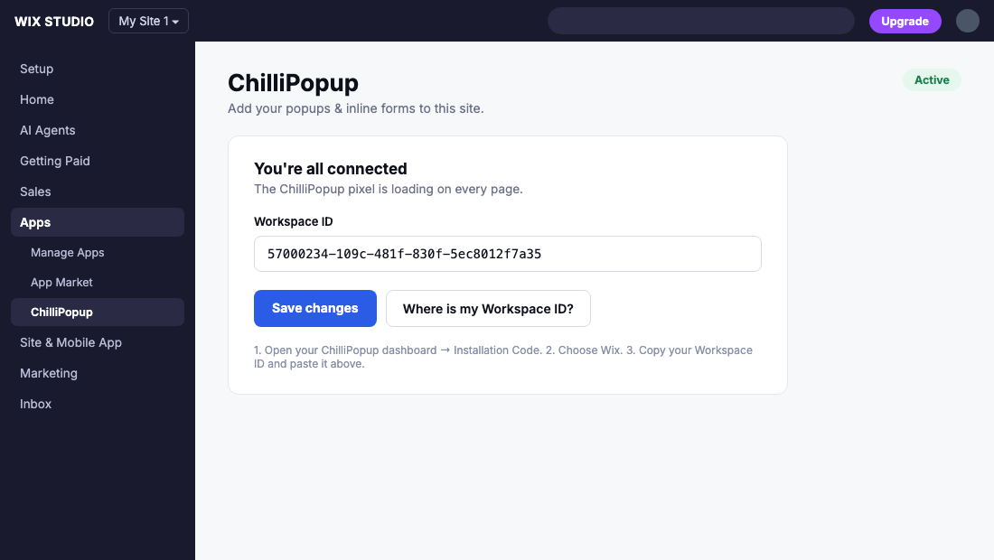 ChilliPopup app settings page in the Wix dashboard showing the Active badge, 'You're all connected' message, and the saved Workspace ID