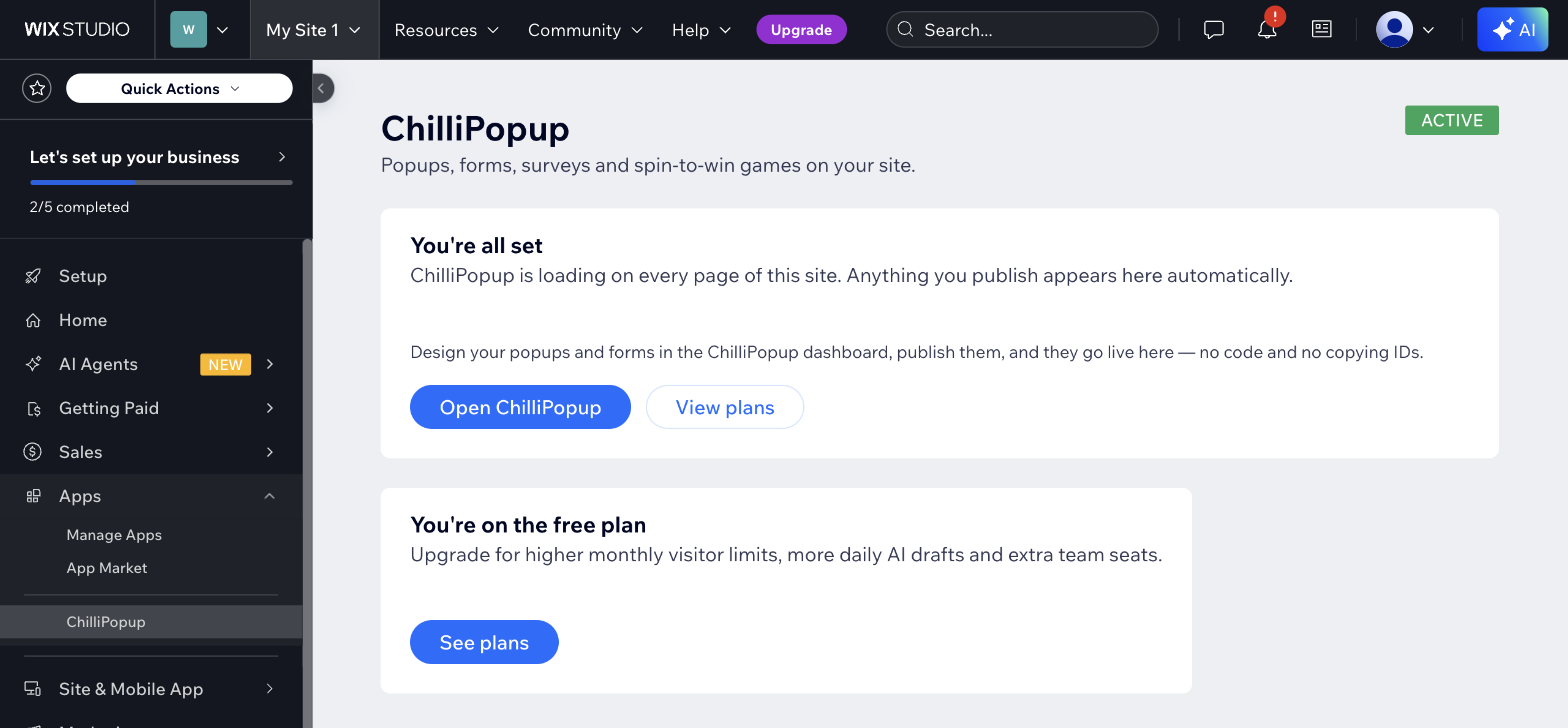 The ChilliPopup page in the Wix dashboard, showing the Active badge, the You're all set card, and the Open ChilliPopup and View plans buttons